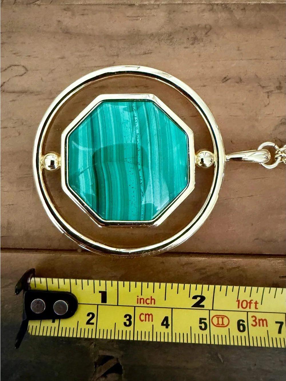 CONNIE CRAIG CARROLL “JONES GOLD-PLATED REVERSIBLE CABOCHON PENDANT NECKLACE